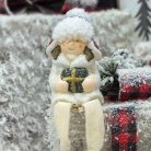 Lógólábú gyermek ajándékkal