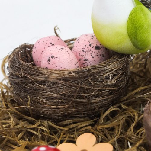 Tojások fészekben lila-rózsaszín-kék